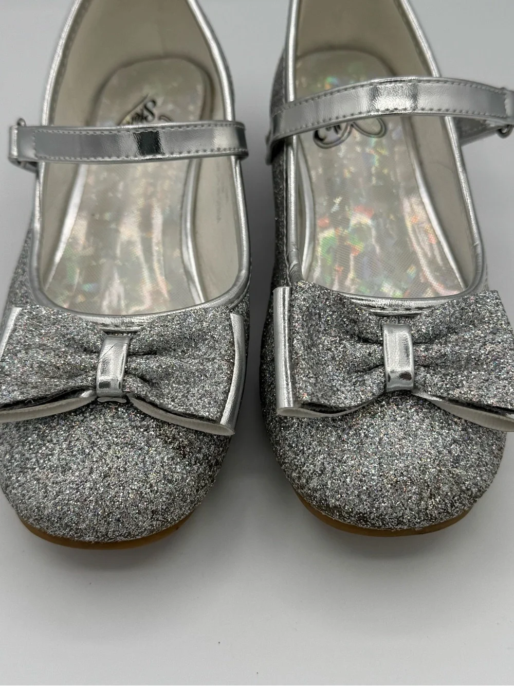 Stelle Mary Jane Silver Glitter Shoes with Prominent Bow
